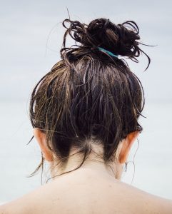 Tight hairstyles contribute to hair loss.