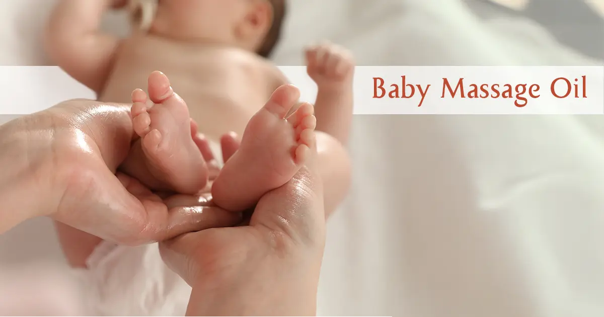 There is an Baby in the Image who is getting Massage by Baby Oil