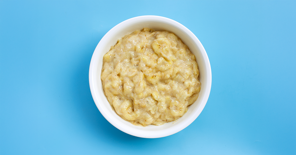 There is Banana face pack in a bowl