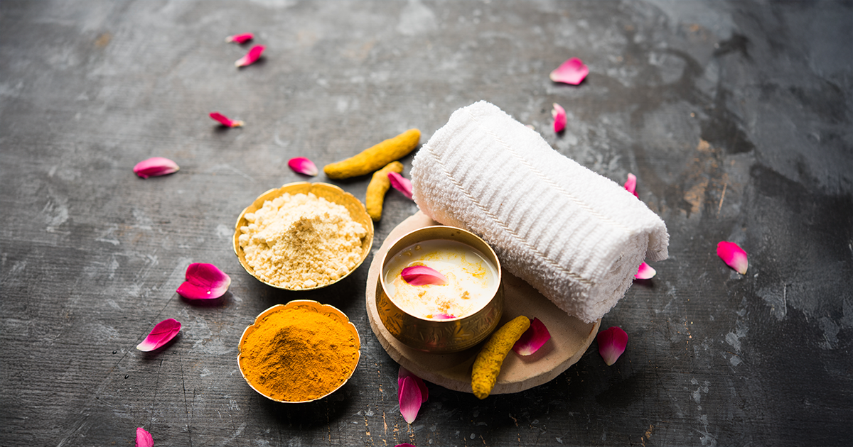 Ingredients for besan, turmeric, and yoghurt face pack