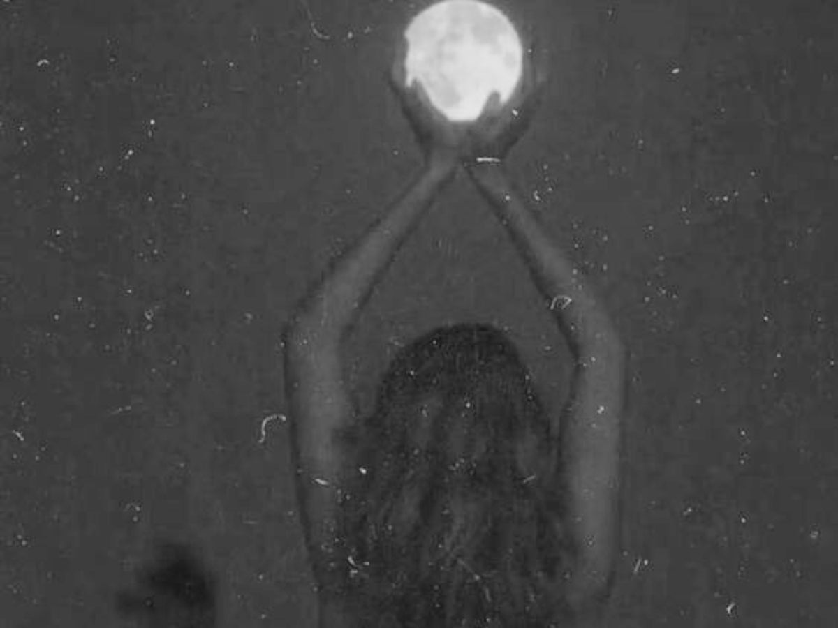 woman holding moon, moon goddess aesthetic photography