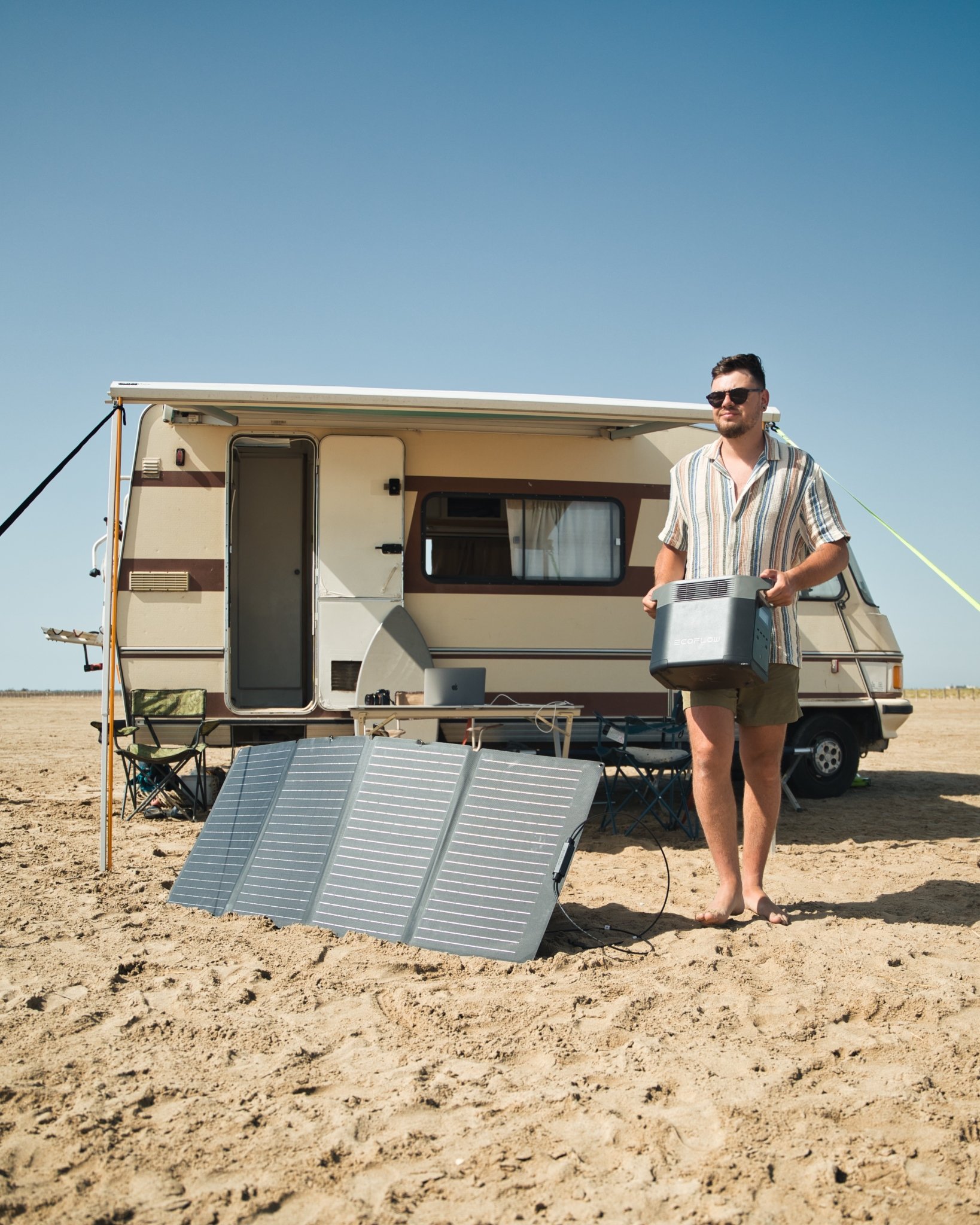Man RVing with Delta 2 Portable Power Station and 160W Portable Solar Panel