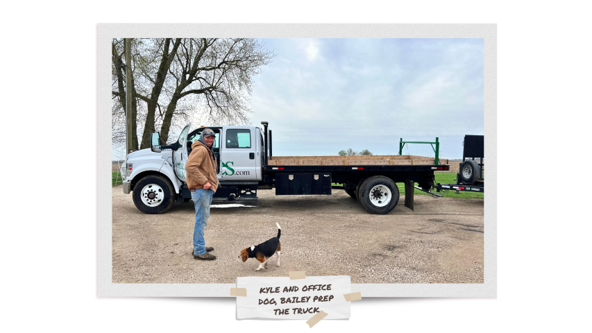 Kyle, Bailey the office dog prepping the truck and stop to smile for a picture