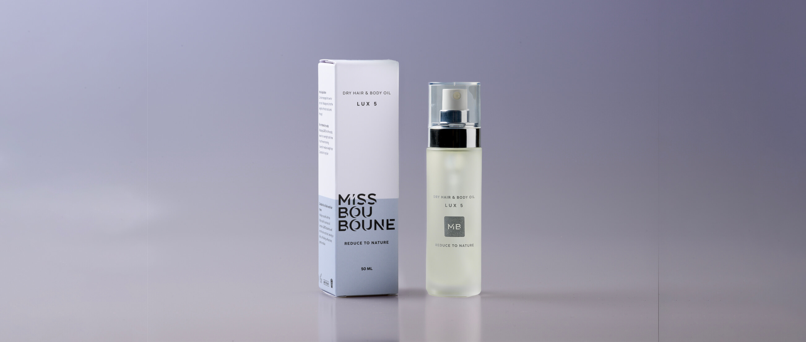 Flacon d'Huile Sèche Lux 5 Miss Bouboune, une huile multi-usage pour nourrir et adoucir les cheveux et le corps, offrant une hydratation légère et non grasse.