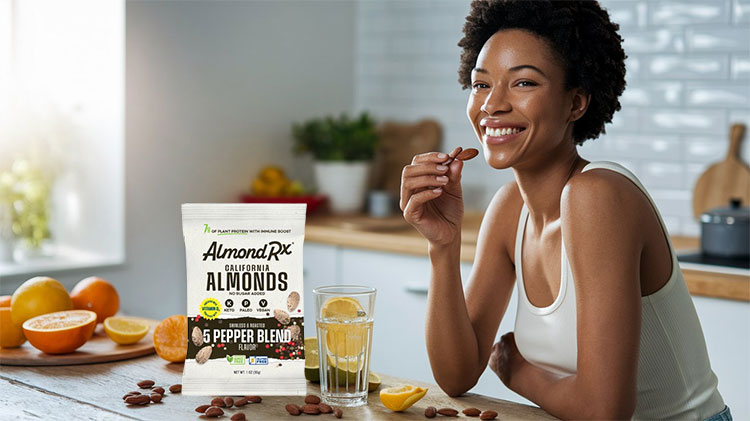 Image showing healthy, hydrated skin alongside a handful of AlmondRx almonds, emphasizing the connection between diet and skin health.