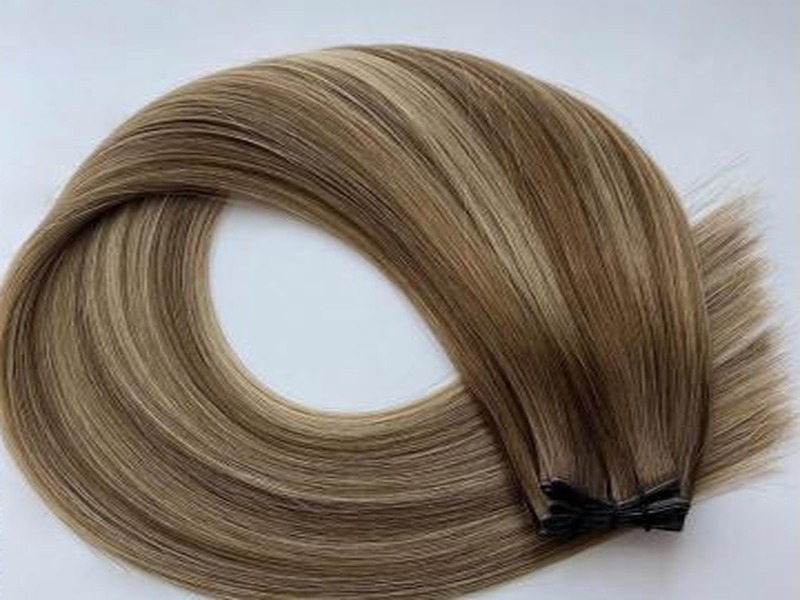 Coiled BELLAMI weft bundle showing smooth, aligned cuticle construction