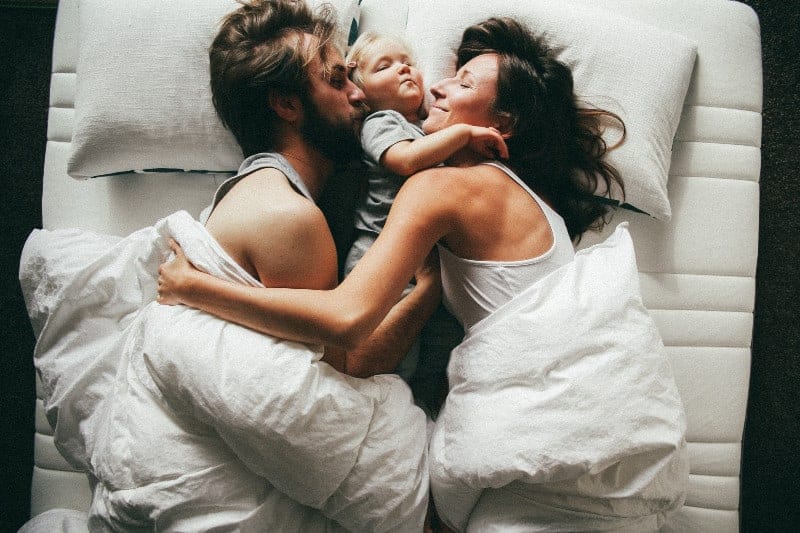 Family sleeping on special mattress for adjustable bed Family sleeping on special mattress for adjustable bed