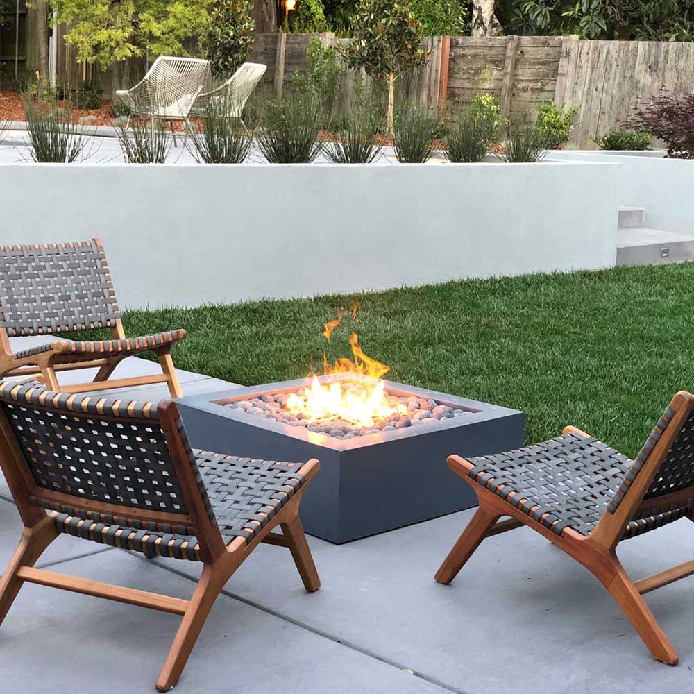 Square gas fire table in an outdoor seating area
