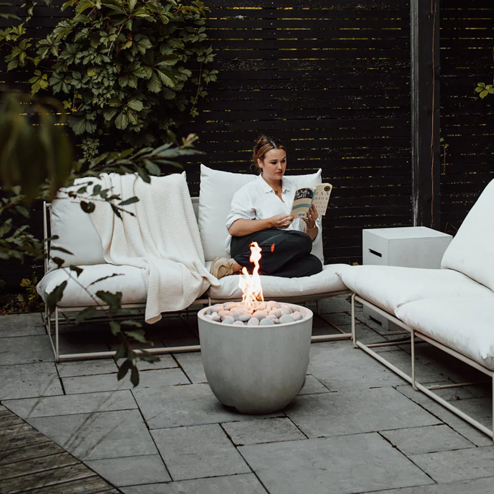 Small patio fire pit with Dekko Element concrete gas fire bowl