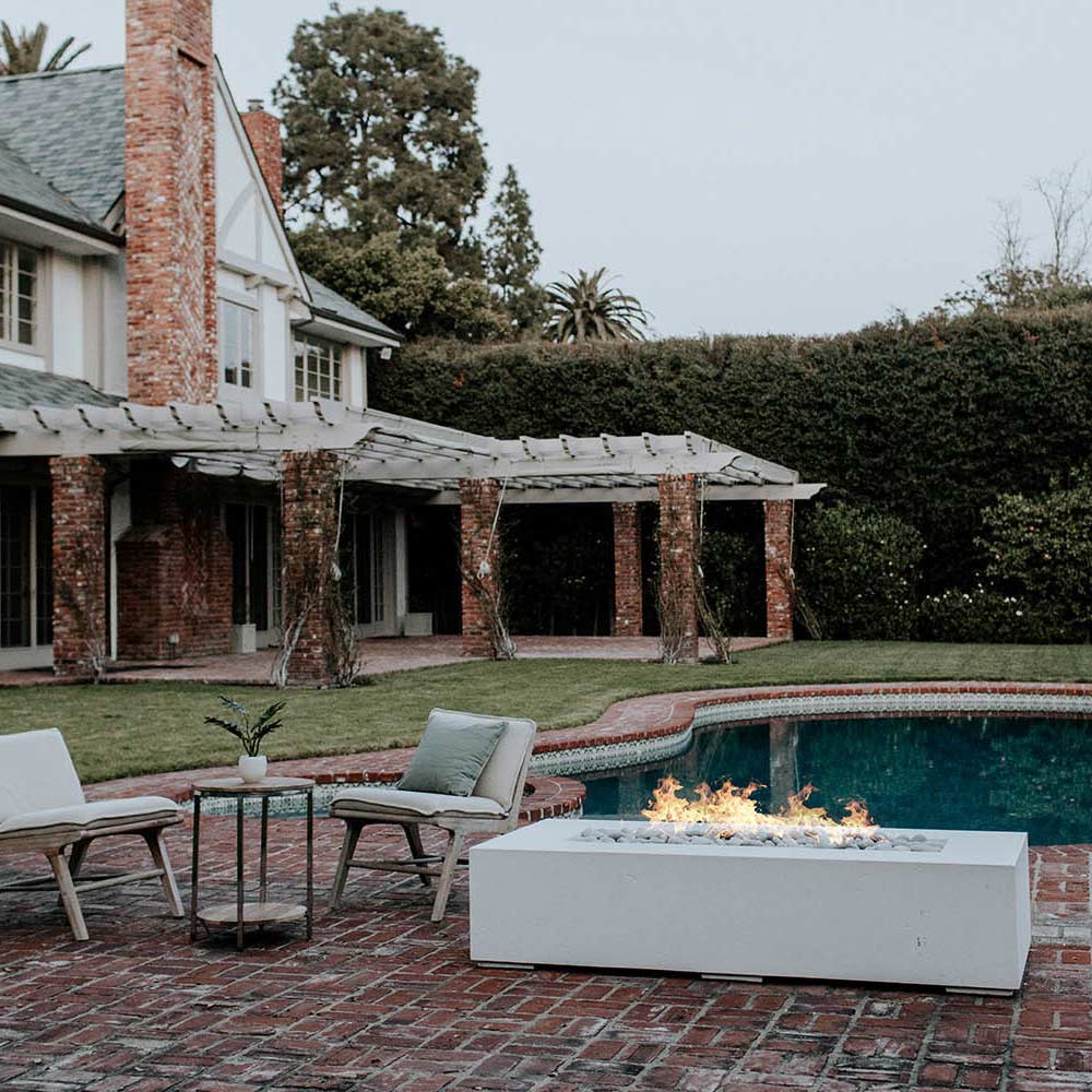 Natural gas fire table in an outdoor patio setting