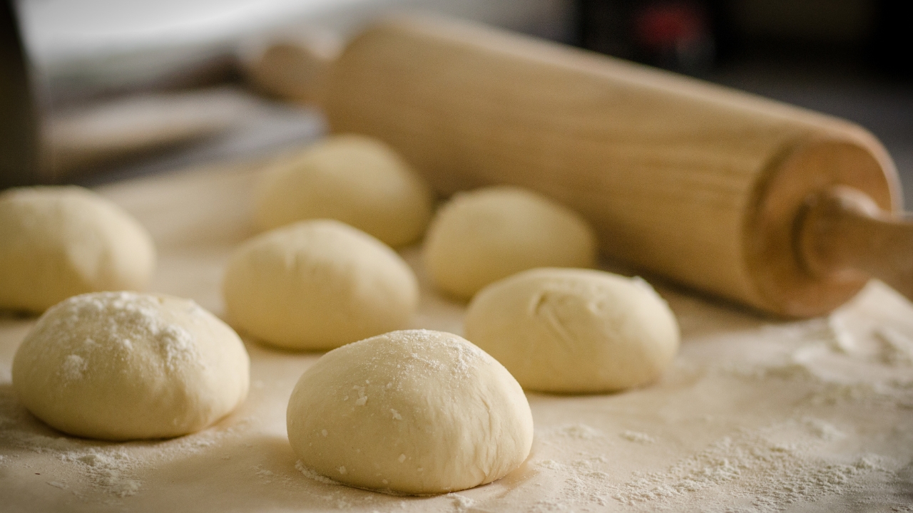 Rolling the dough for Garlic Naan