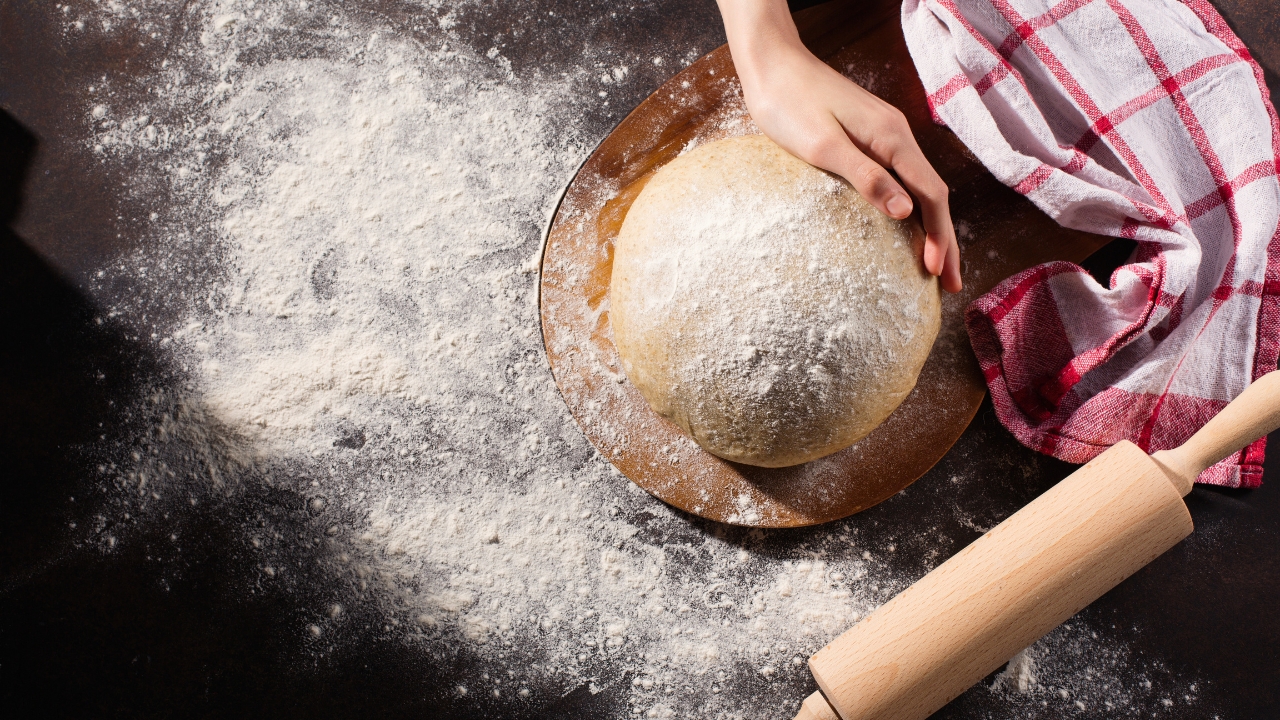 kneading the dough for Lachha Paratha