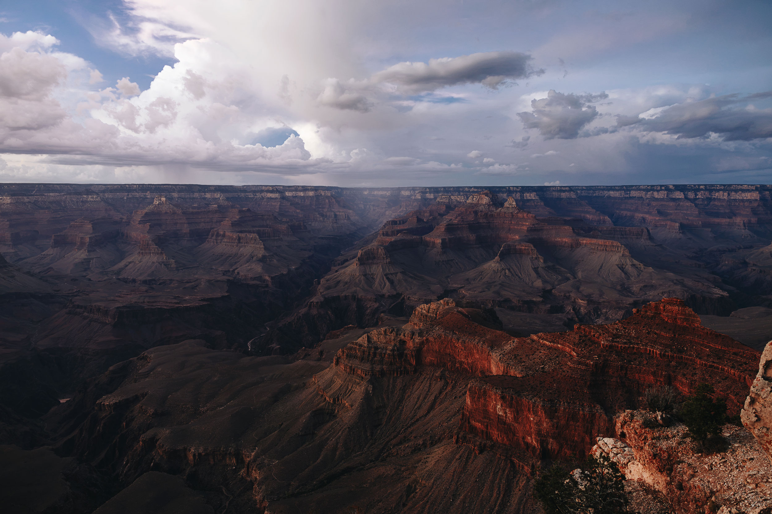 Monsoon storm over Bright Angel Canyon, viewed from Mather Point at Grand Canyon National Park.