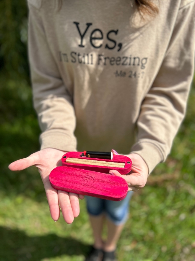 pink king size joint case with a lighter