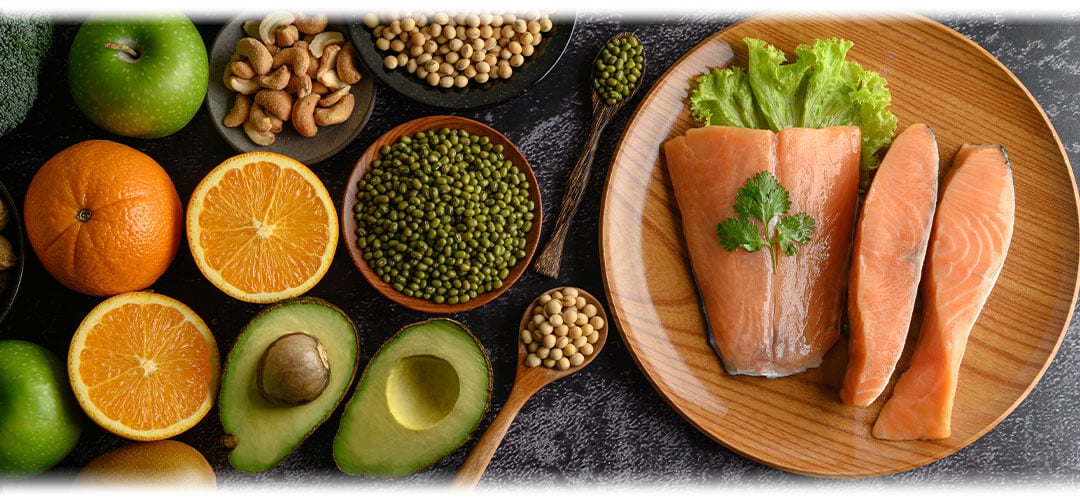 A close-up image of various foods rich in vitamin B, including leafy greens, eggs, nuts, and fish. The assortment highlights sources of vitamin B, essential for overall health and well-being.