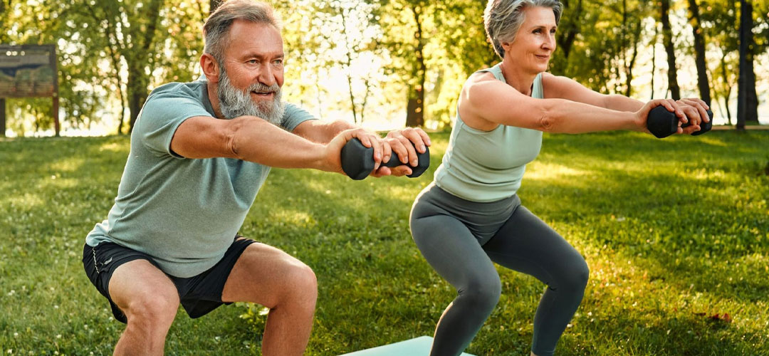 couple exercising working on knee bending