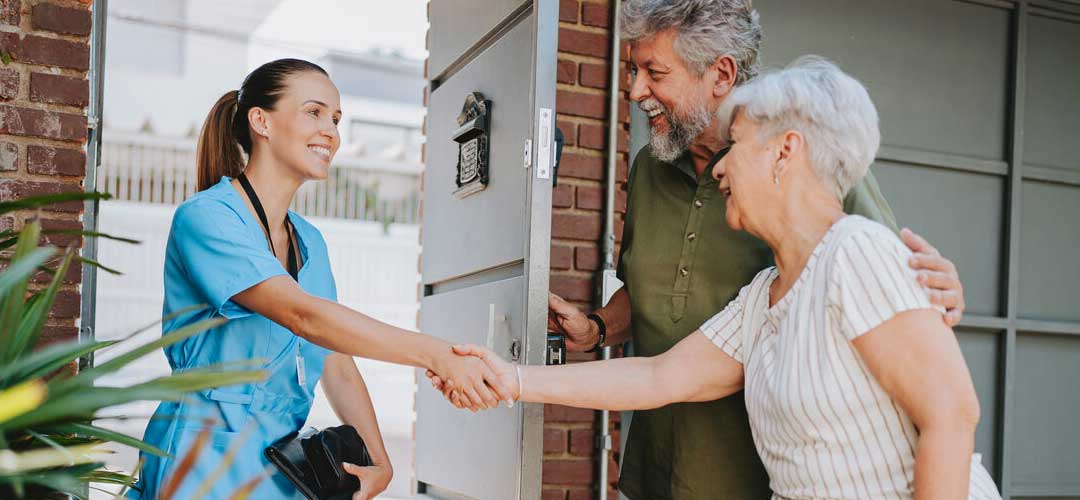 Practitioner visiting client at home