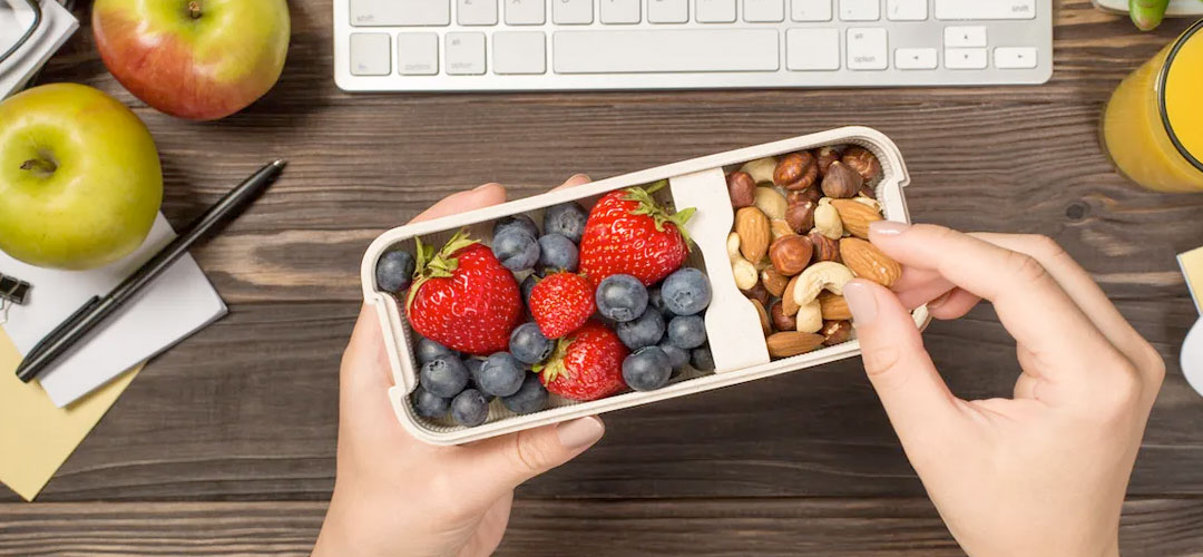 healthy snack box full of nuts and fruit