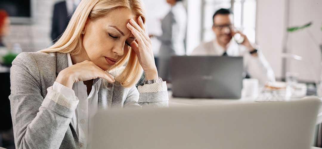 Female suffering stress at the office