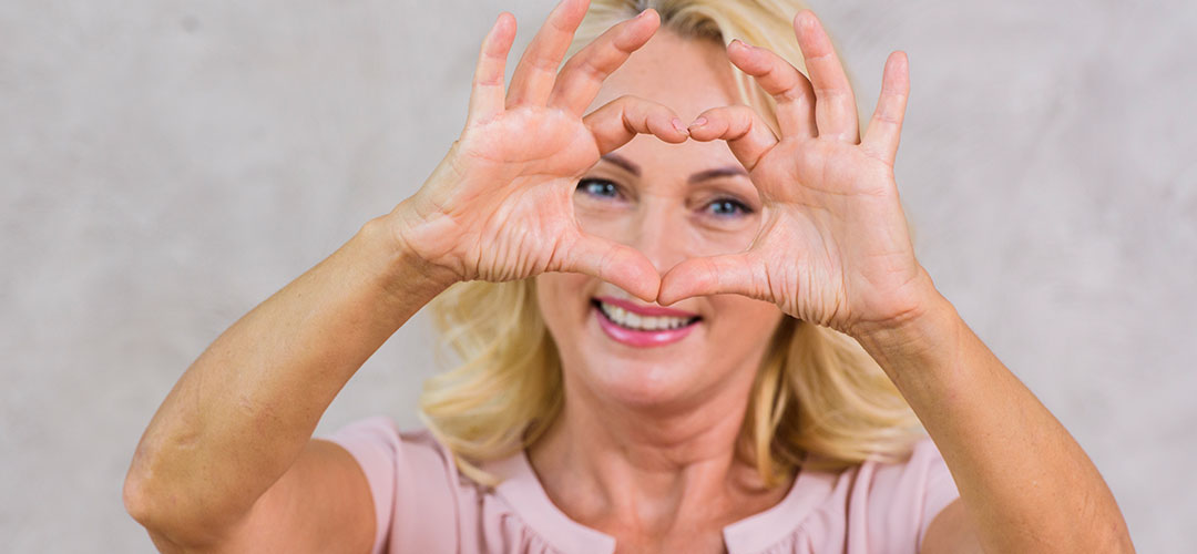 50plus lady happy with healthy eye helped by supplements