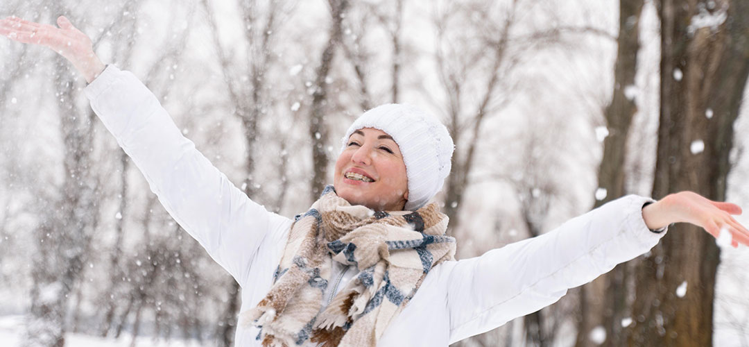 close-up-happy-adult-playing-snow