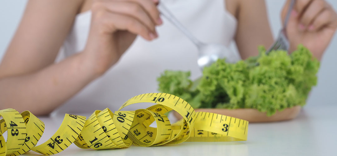 asian-women-are-tired-of-eating-vegetables-using-a-fork