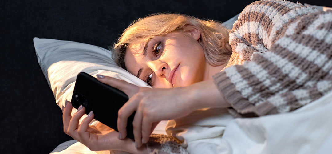 young-blonde-girl-is-her-smartphone-bed-trying-fall-asleep-social-media-addiction