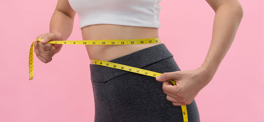 diet-and-dieting-beauty-slim-female-body-use-tape-measure