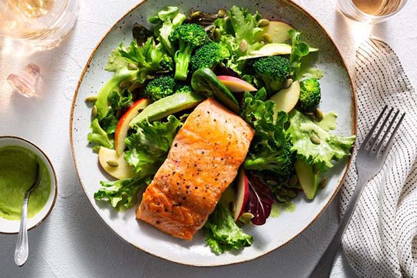healthy salad salmon avocado greens