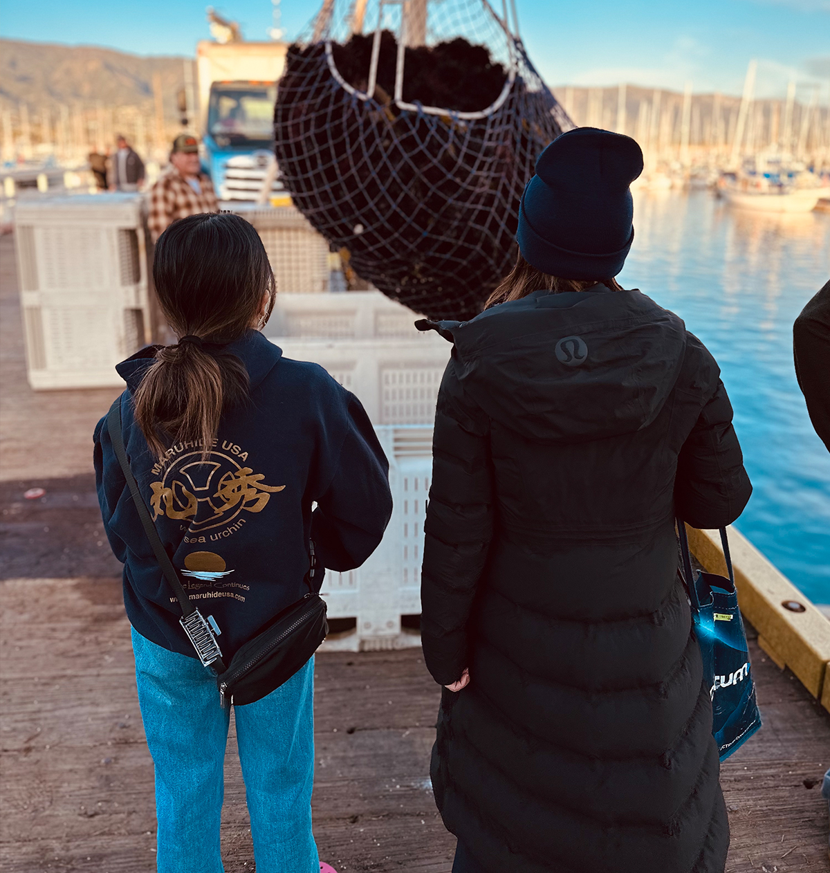 Christine with her daughter at the harbor 