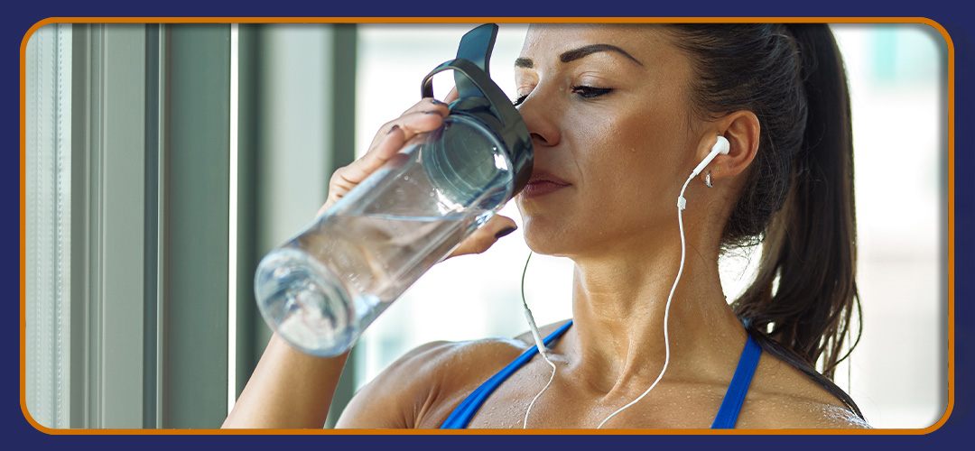 Hydrated woman after a workout, endorsing Pro-Fit's commitment to health.