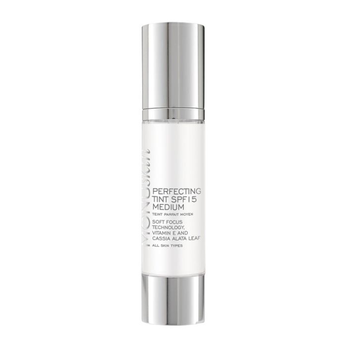 product image of monuskin perfecting skin SPF15 medium bottle with silver lid