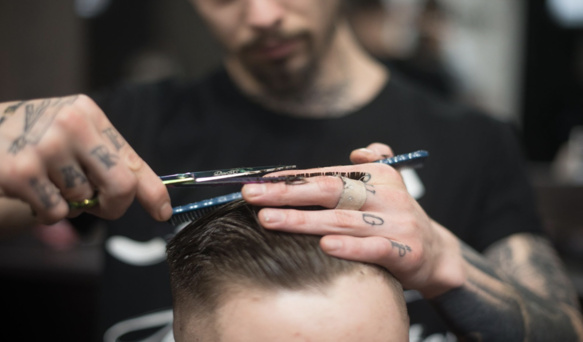 barber cutting hair