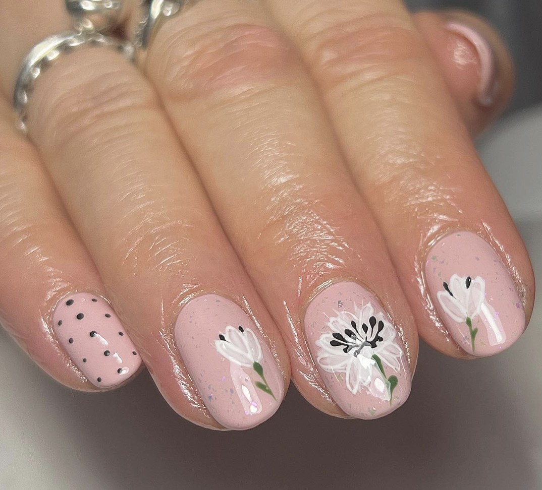 Image of nails featuring floral art.