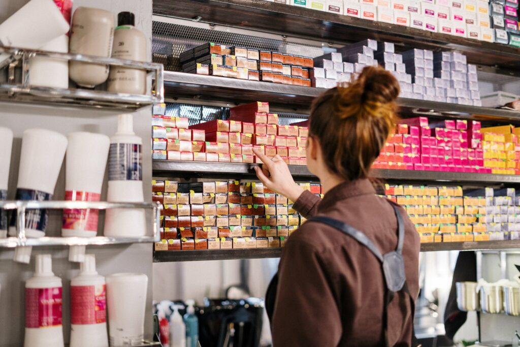 Salon owner selecting colour