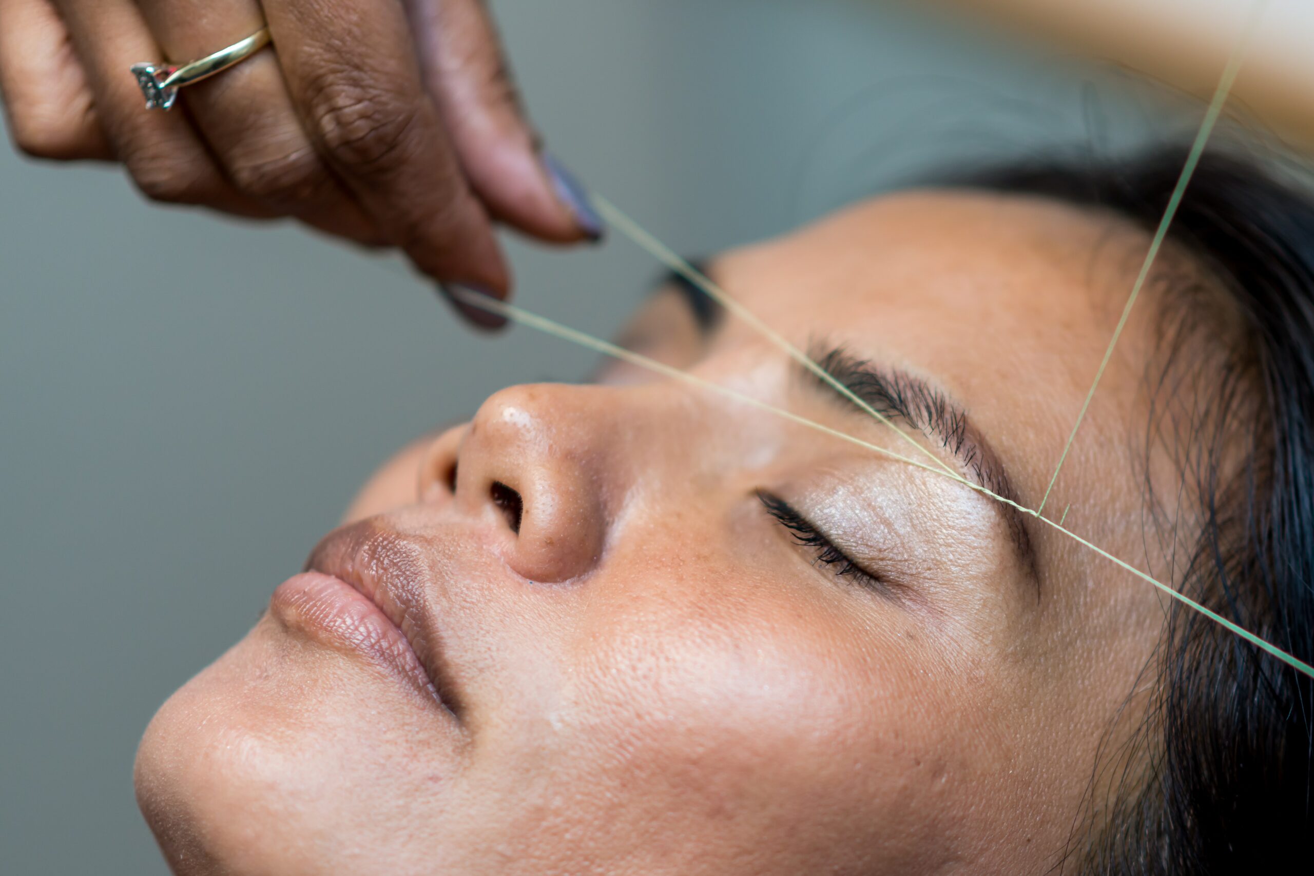Woman has eyebrows waxed