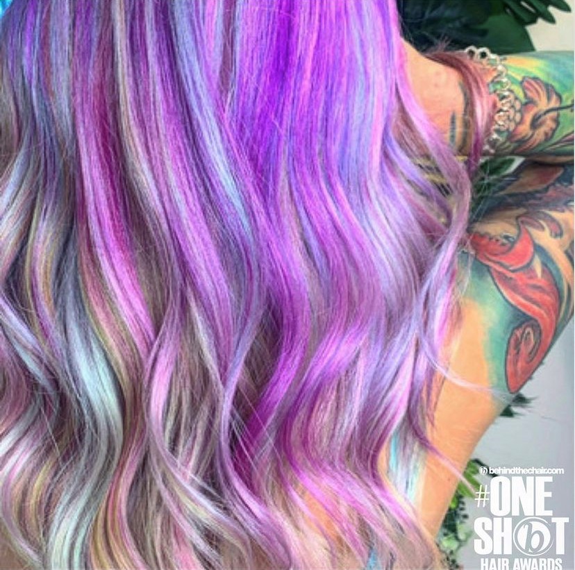 back of womans head long purple and silver hair