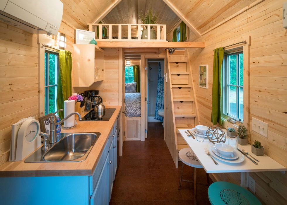 Interior design of a tiny house with space-saving furniture