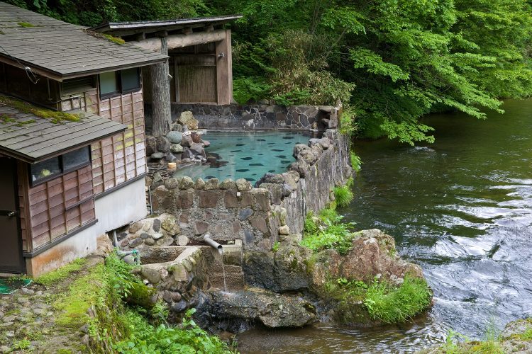 Hot onsen on the banks of the river, where fish were rising!