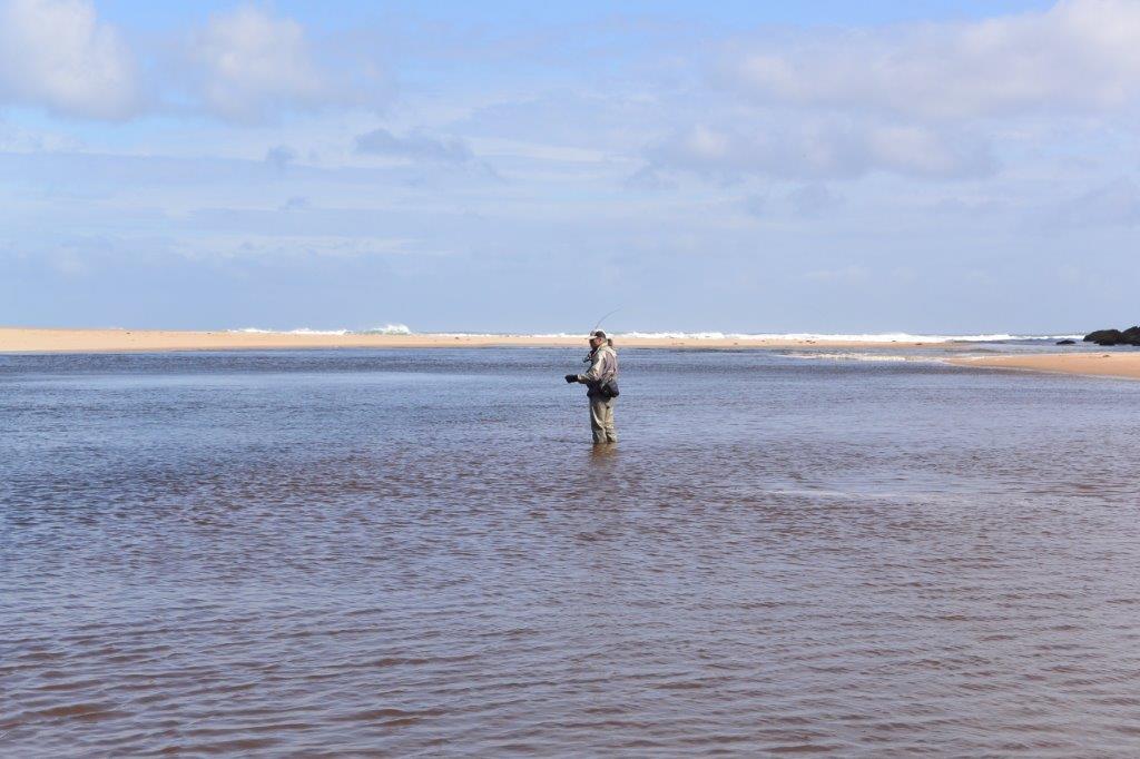 Open river mouths certainly help my bream fishing confidence - note the small wave heading up river towards Max.