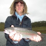 Sam first rainbow on fly