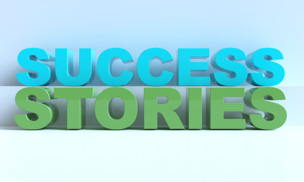 success stories spelled out in blue and green letters