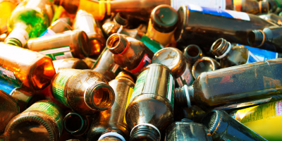 a pile of empty glass bottles.