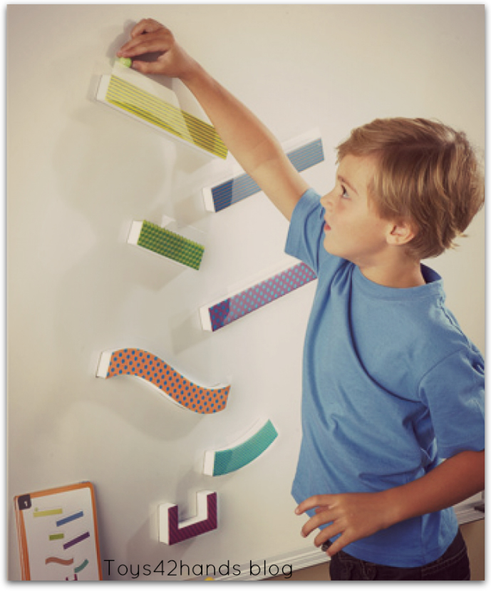 Crossing the body diameter by playing with the magnetic marble track